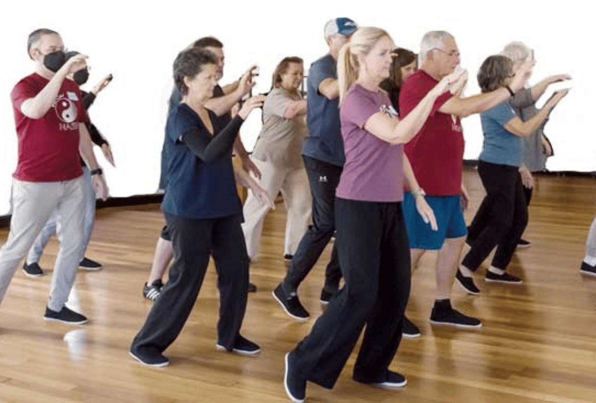 Students practicing tai chi